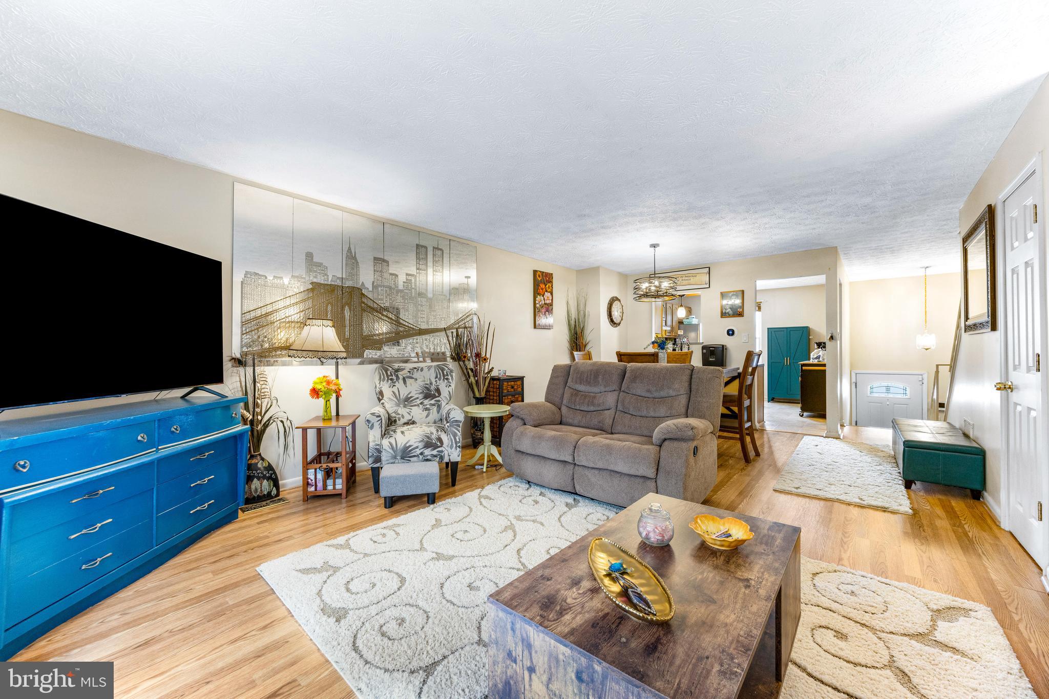 2805 Beckon Drive Edgewood, MD 21040 - Photo 6 of 35 a living room with furniture and a flat screen tv