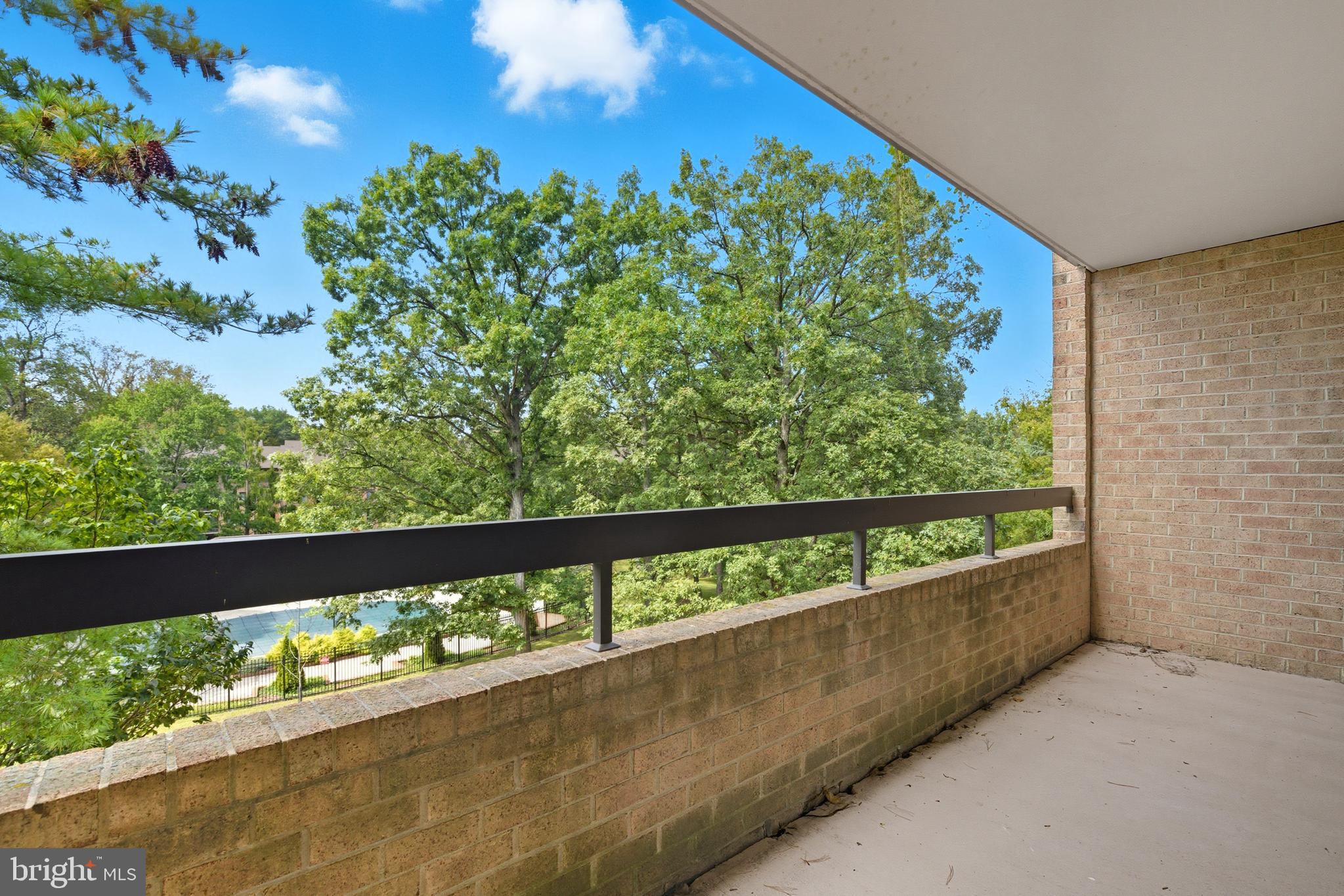 11430 Strand Drive, Unit R203 Rockville, MD 20852 - Photo 21 of 31 a view of a green field