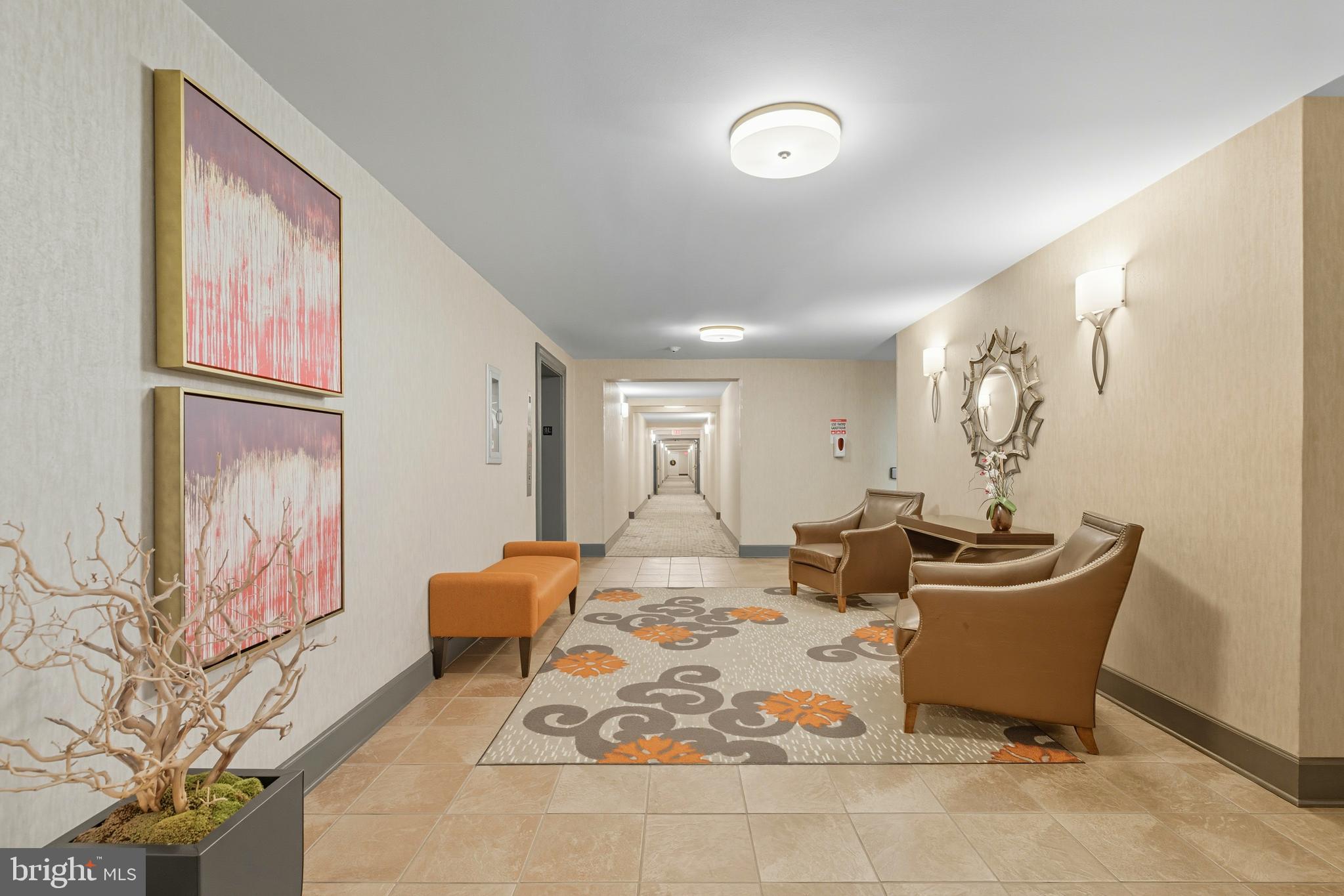 11430 Strand Drive, Unit R203 Rockville, MD 20852 - Photo 22 of 31 a living room with furniture and window