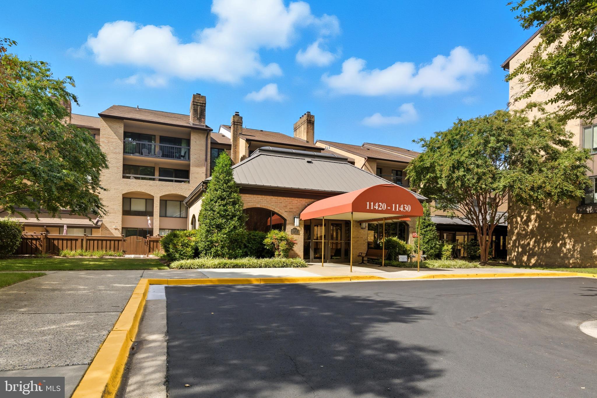 11430 Strand Drive, Unit R203 Rockville, MD 20852 - Photo 26 of 31 a view of outdoor space yard and front view of a building
