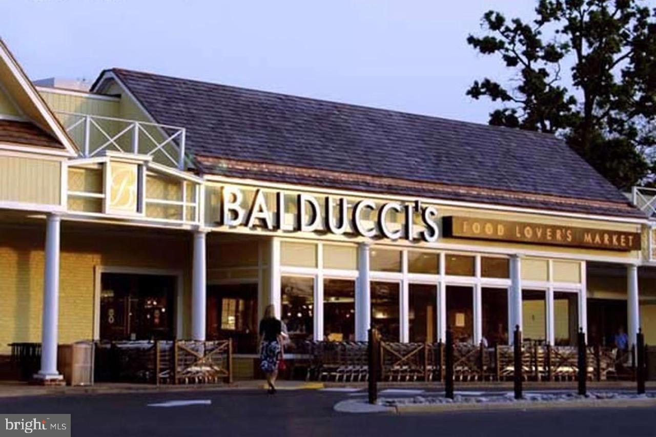 11430 Strand Drive, Unit R203 Rockville, MD 20852 - Photo 28 of 31 front view of a building