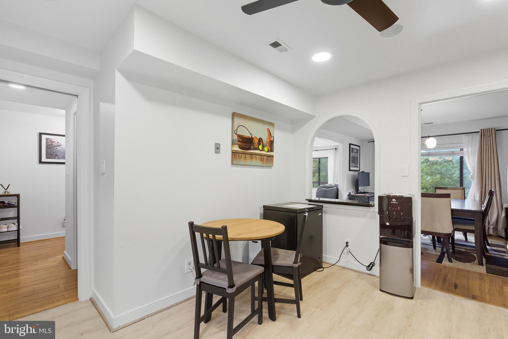 11430 Strand Drive, Unit R203 Rockville, MD 20852 - Photo 6 of 31 a dining room with furniture and window