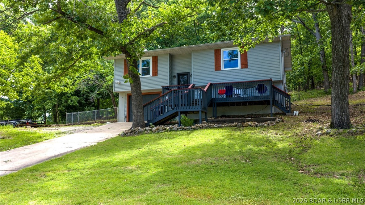 54 Sunset Road Lake Ozark, MO 65049 - Photo 2 of 37 Large front yard