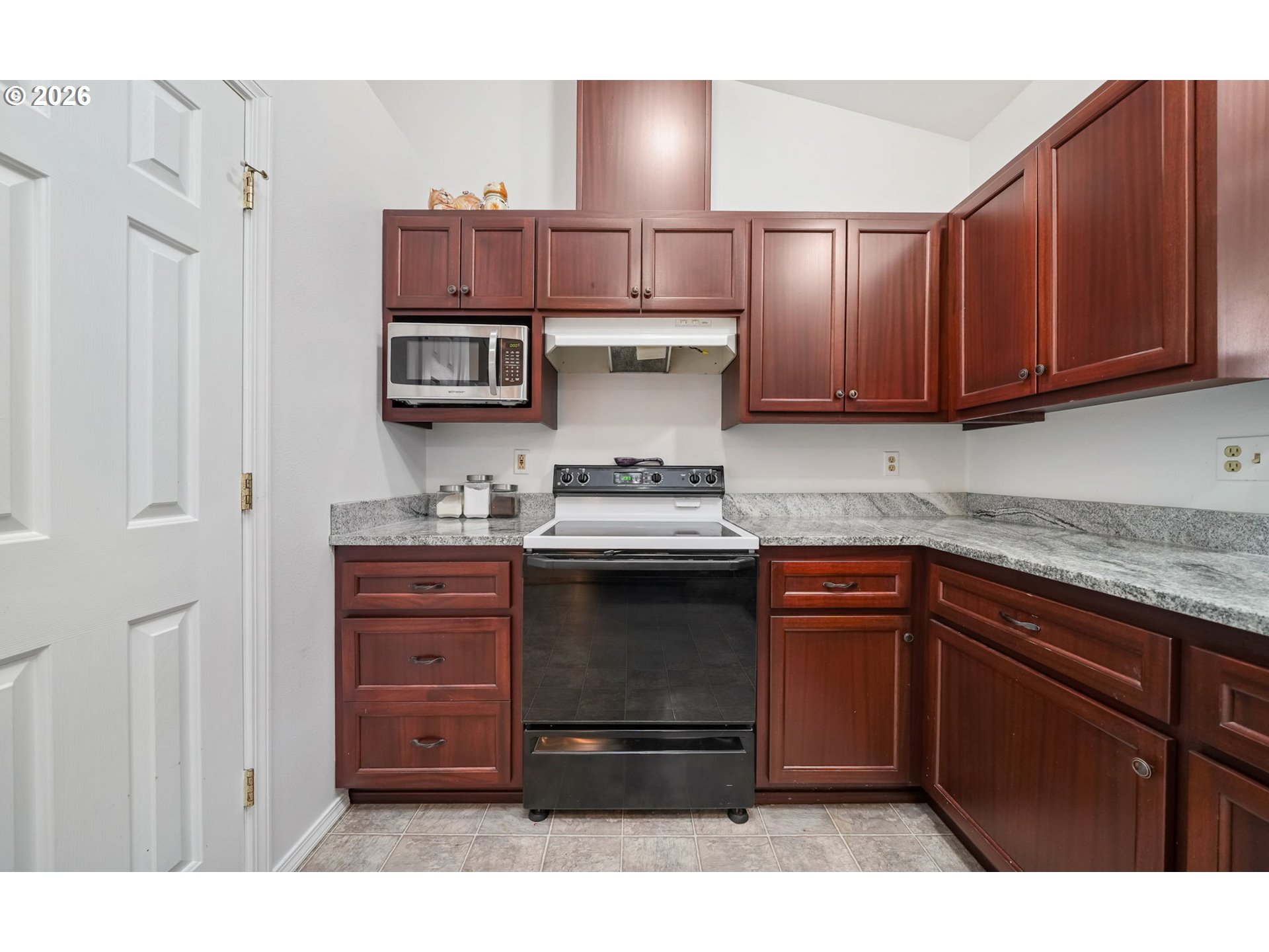 2102 South 8th Street Cottage Grove, OR 97424 - Photo 15 of 28 a kitchen with stainless steel appliances granite countertop a stove and a cabinets