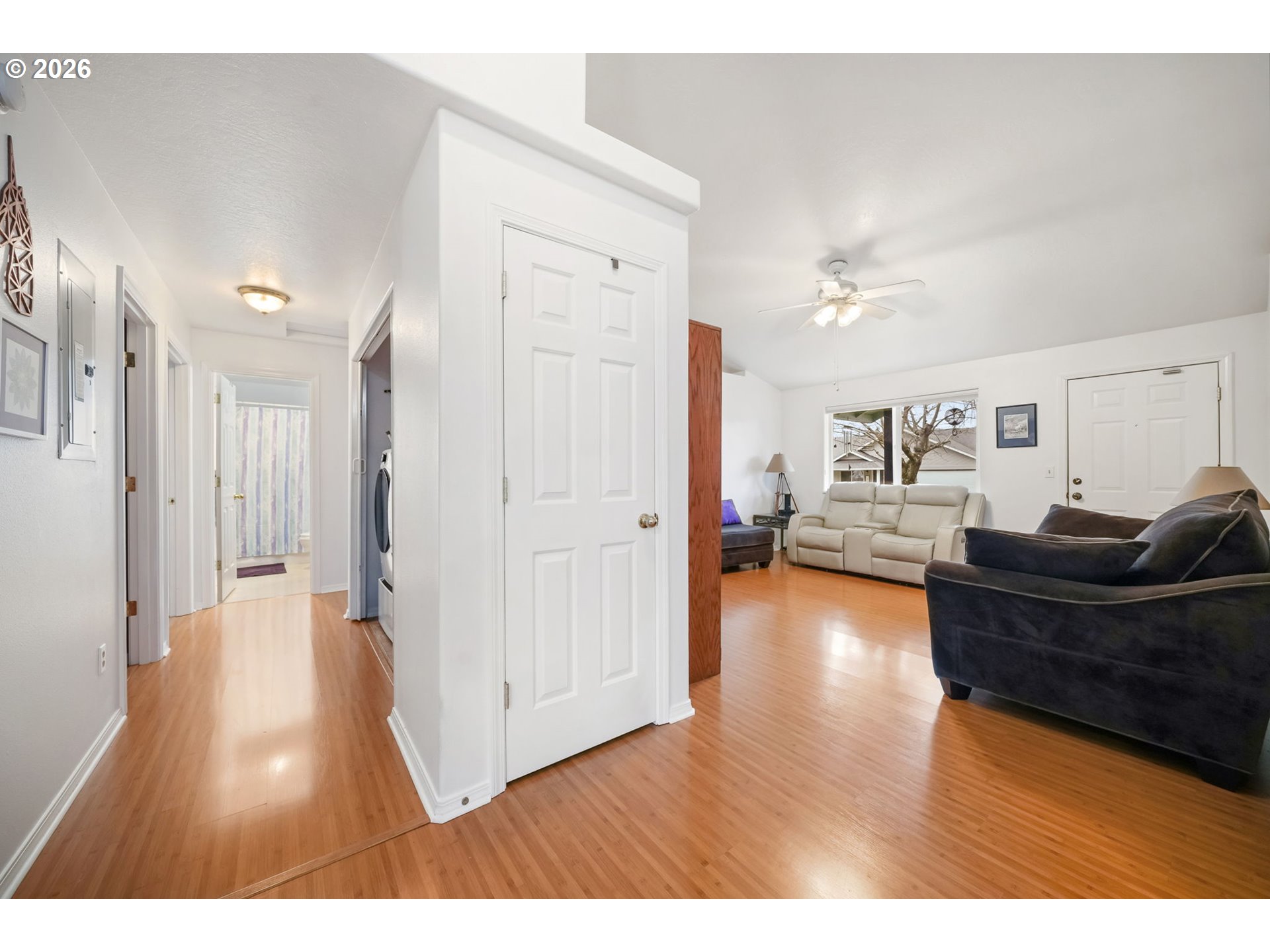 2102 South 8th Street Cottage Grove, OR 97424 - Photo 16 of 28 a living room with furniture and a wooden floor
