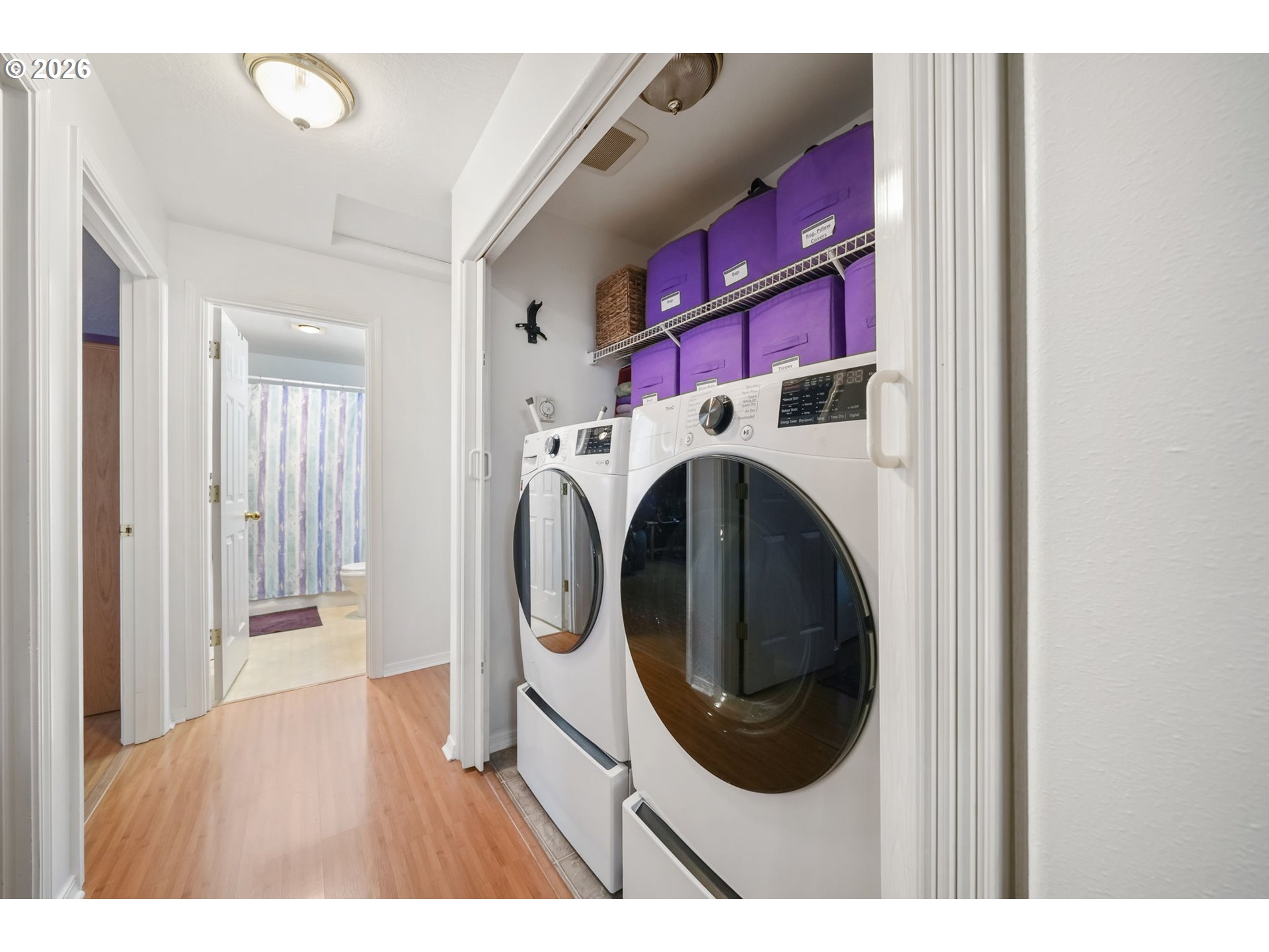 2102 South 8th Street Cottage Grove, OR 97424 - Photo 17 of 28 a view of a bedroom with washer and dryer