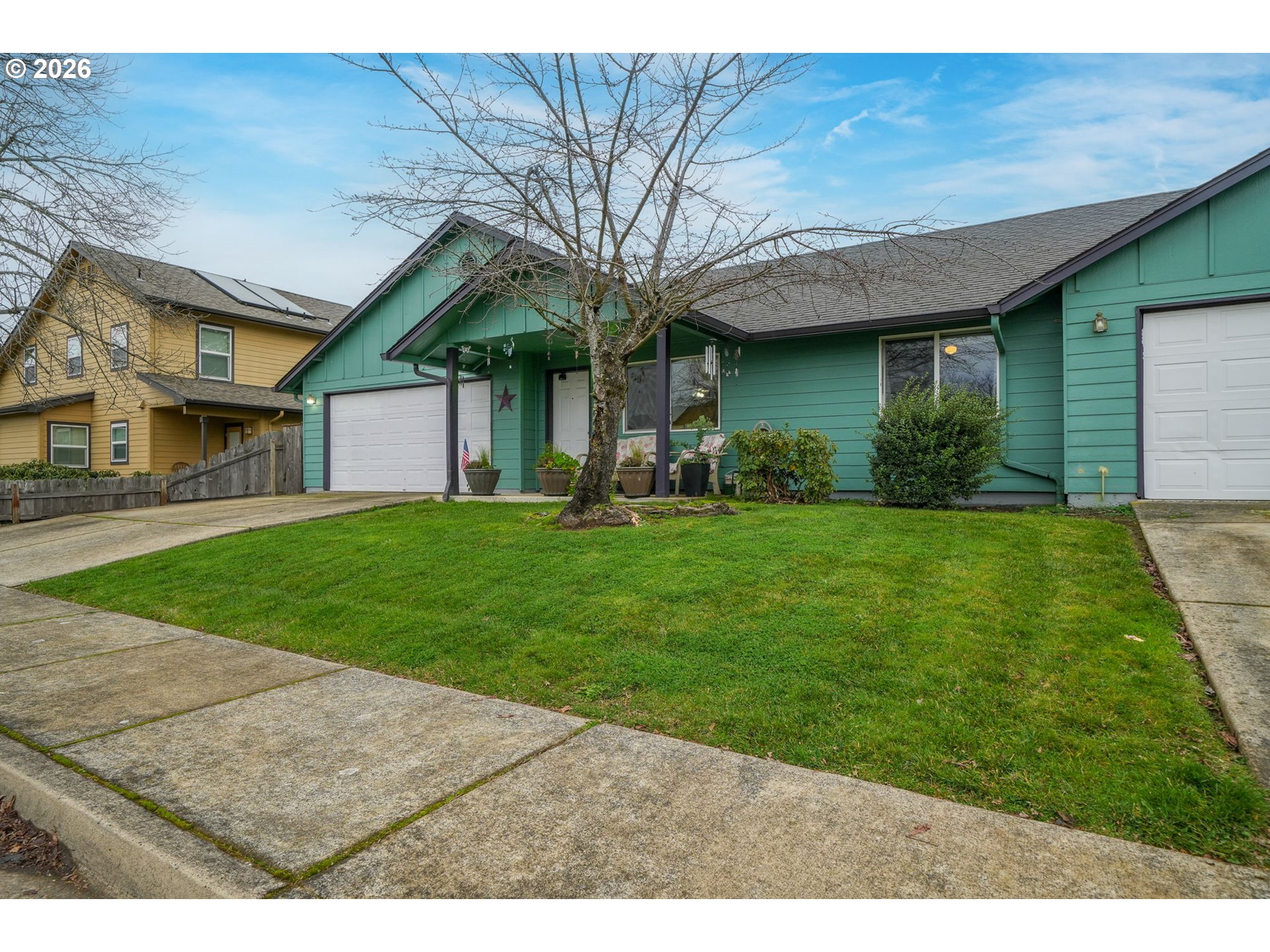 2102 South 8th Street Cottage Grove, OR 97424 - Photo 2 of 28 a view of a house with a yard and sitting area