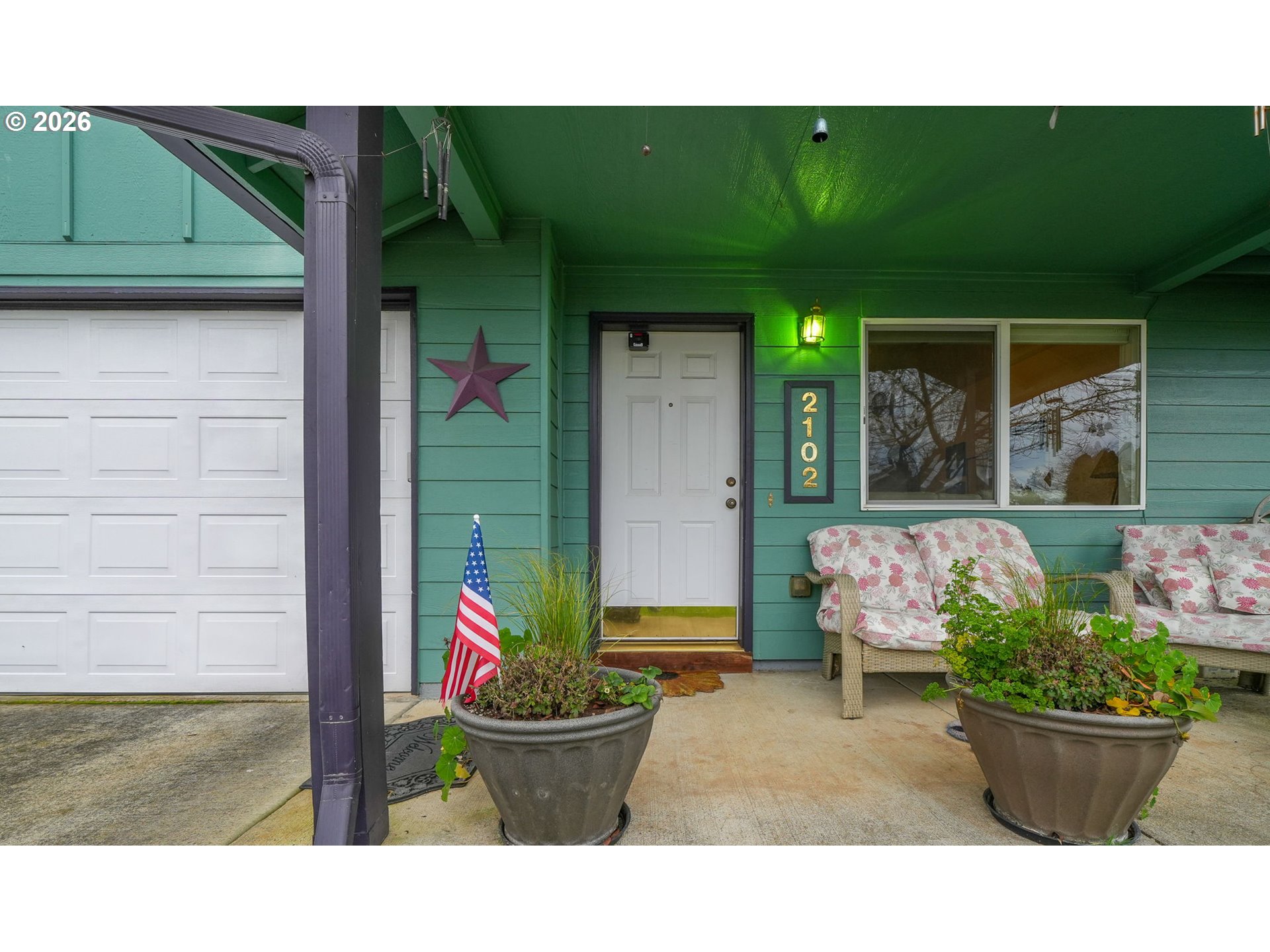 2102 South 8th Street Cottage Grove, OR 97424 - Photo 3 of 28 a view of a house with patio