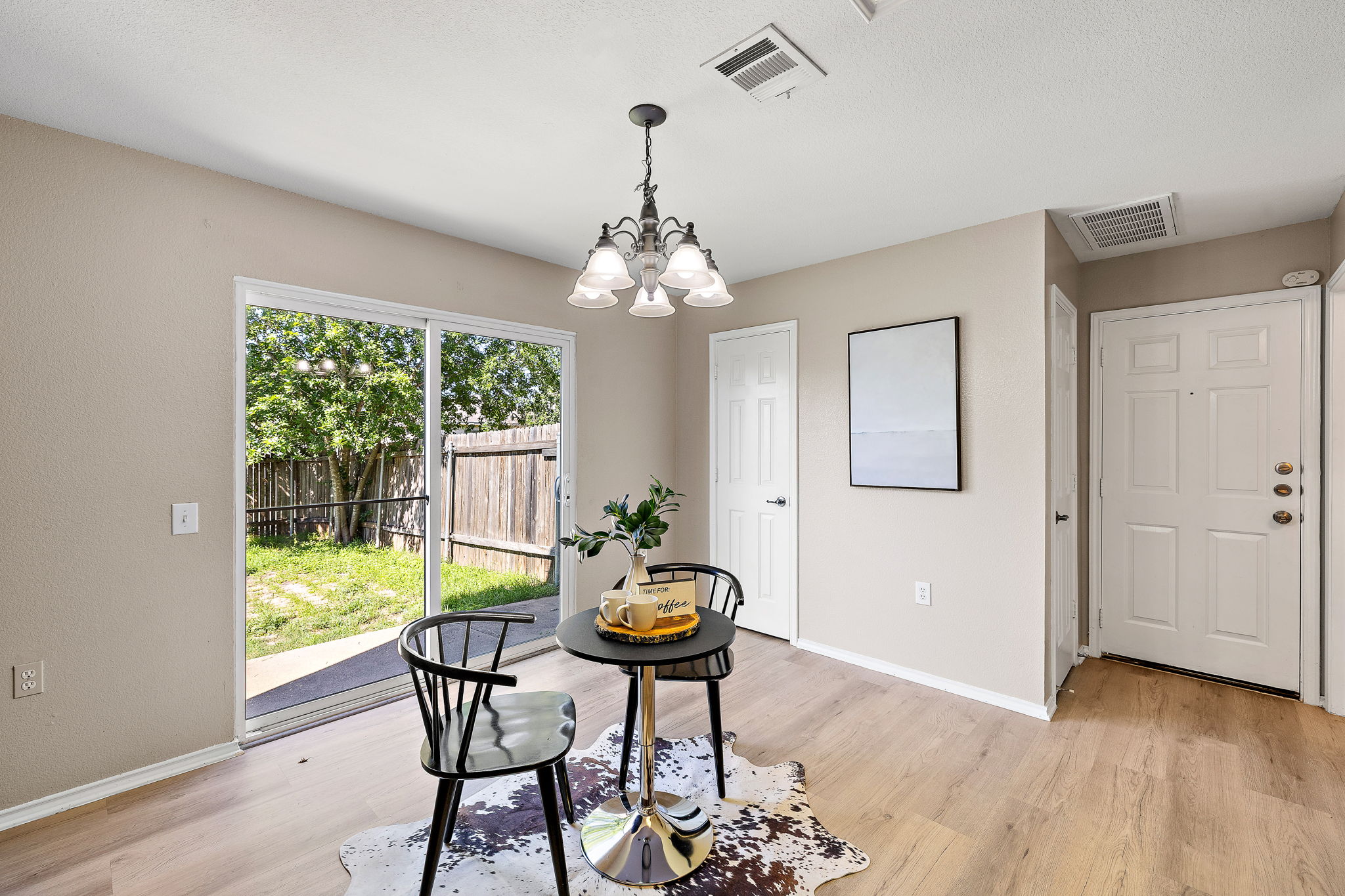 5705 Viewpoint Drive Austin, TX 78744 - Photo 14 of 30 Breakfast with backyard views and plenty of natural light.