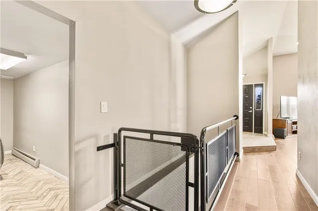 a view of a bedroom from a hallway