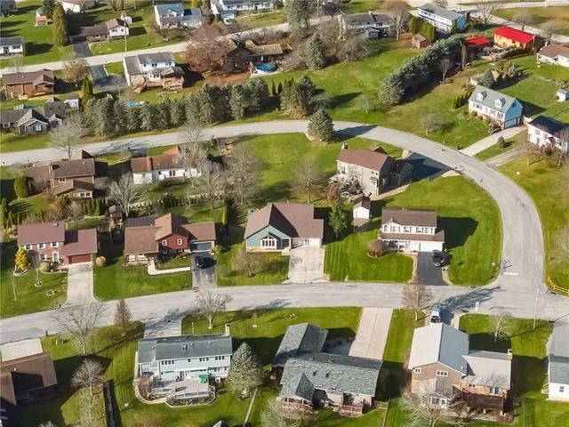 a view of houses with outdoor seating