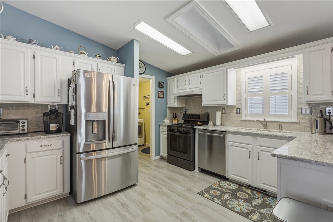136 Rocking Chair Road Big Flats, NY 14845 - Photo 7 of 38 Fabulous bright kitchen with skylights!