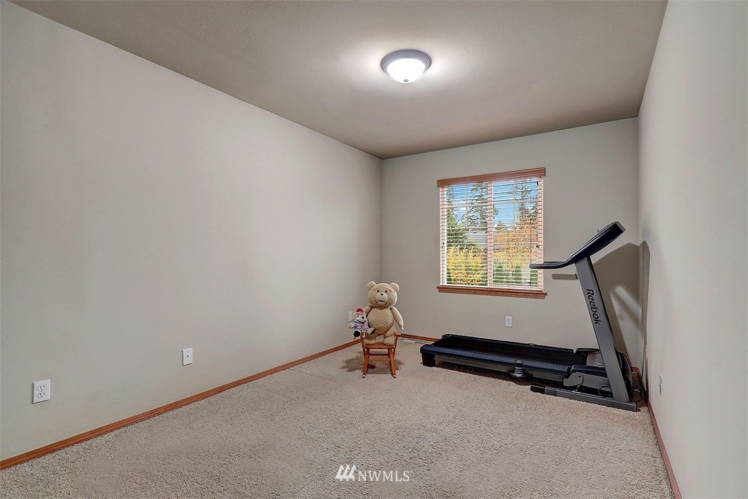 105 196th Place Southwest Bothell, WA 98012 - Photo 12 of 18 an empty room with windows