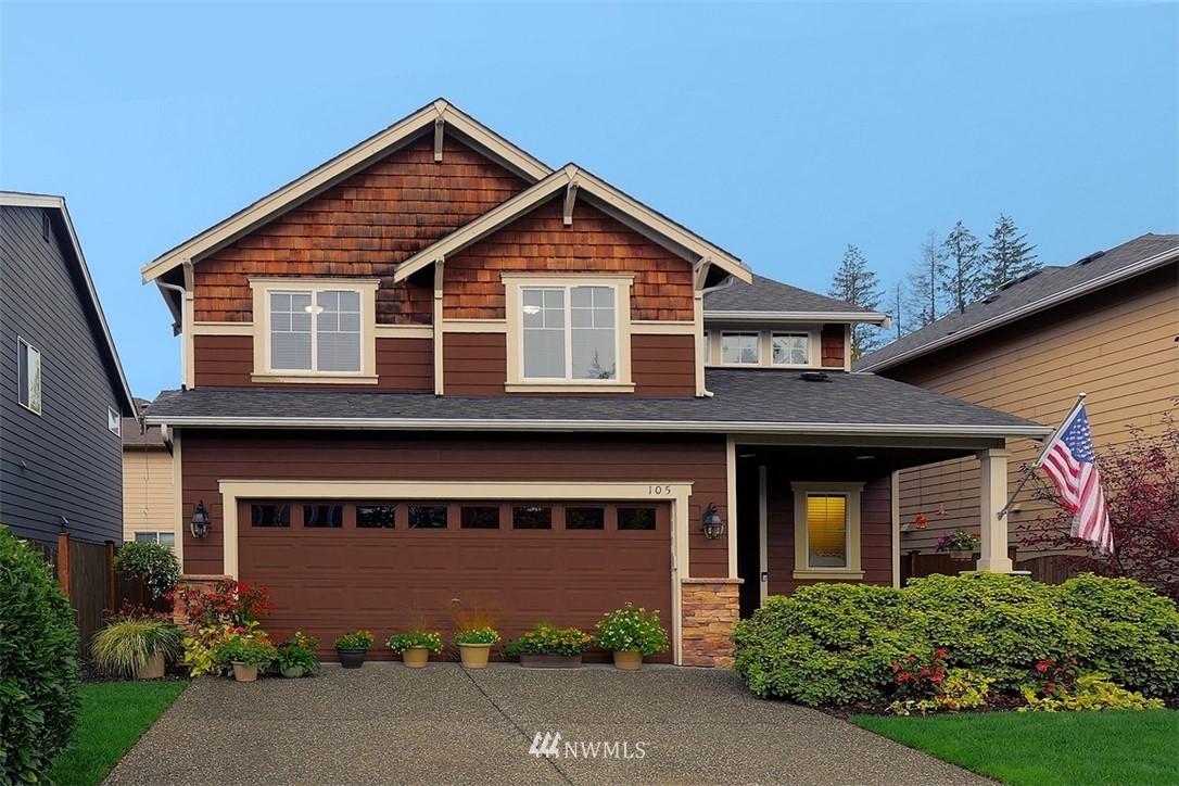 105 196th Place Southwest Bothell, WA 98012 - Photo 18 of 18 front view of brick house with a yard