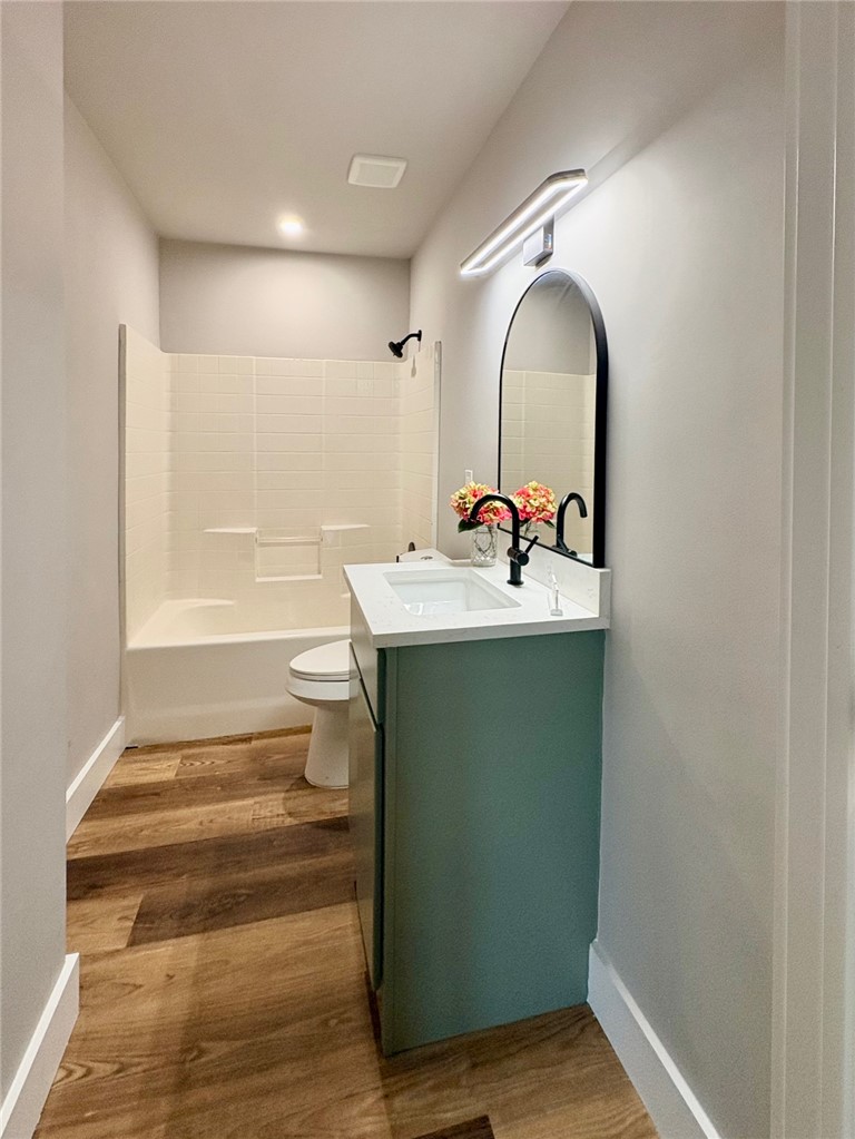 102 Terral Court Cameron, TX 76520 - Photo 11 of 14 a room with a washing machine and sink