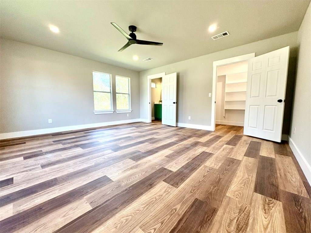 102 Terral Court Cameron, TX 76520 - Photo 7 of 14 a view of a livingroom with a staircase