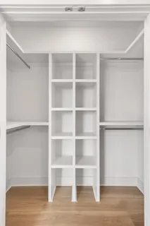 a bathroom with sink mirror and bathtub