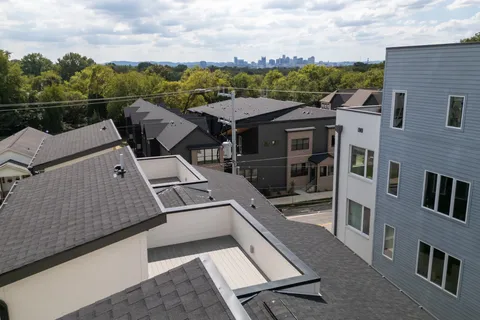 a city view with tall buildings