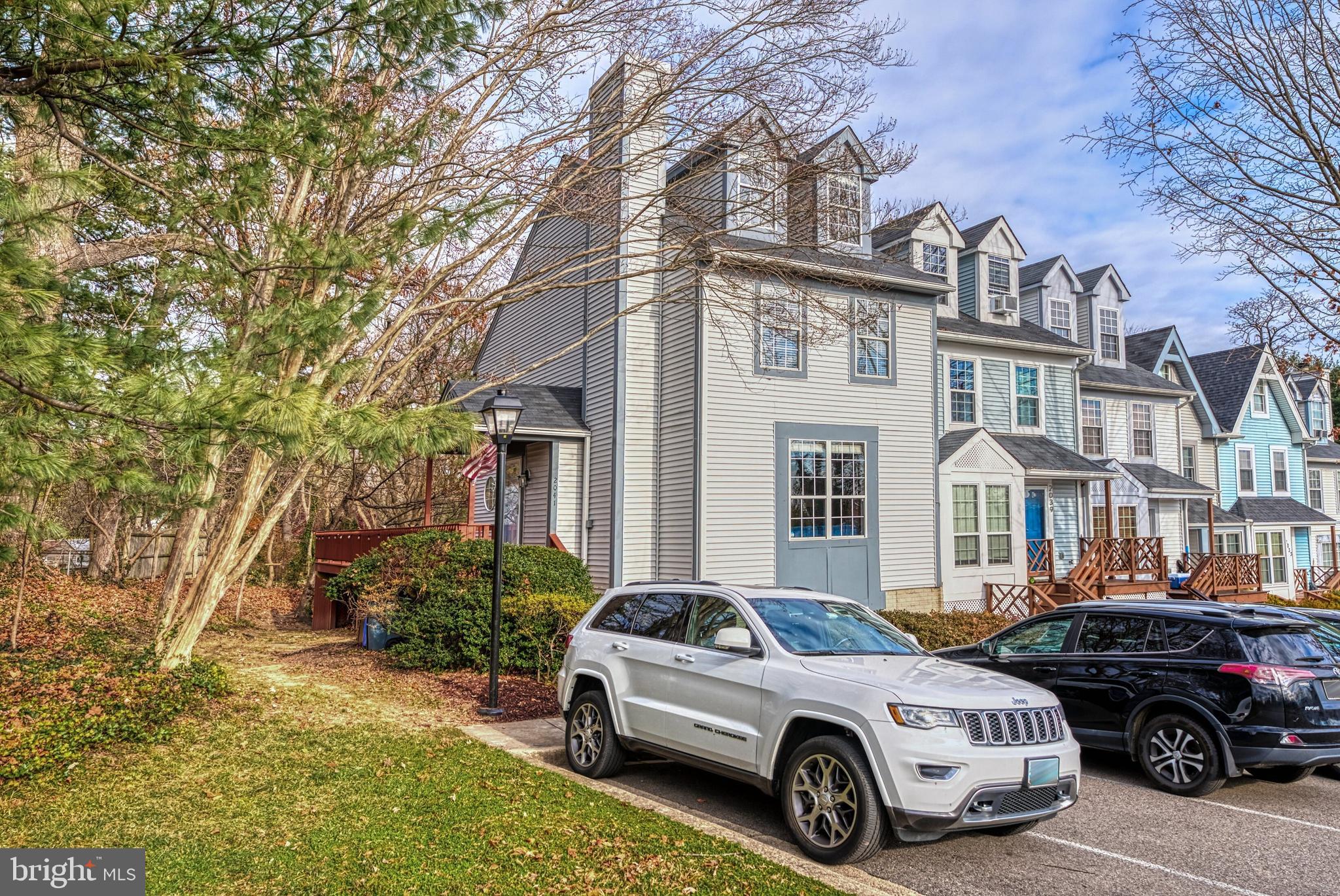 2041 Lyttonsville Road Silver Spring, MD 20910 - Photo 2 of 42 a car parked in front of a house