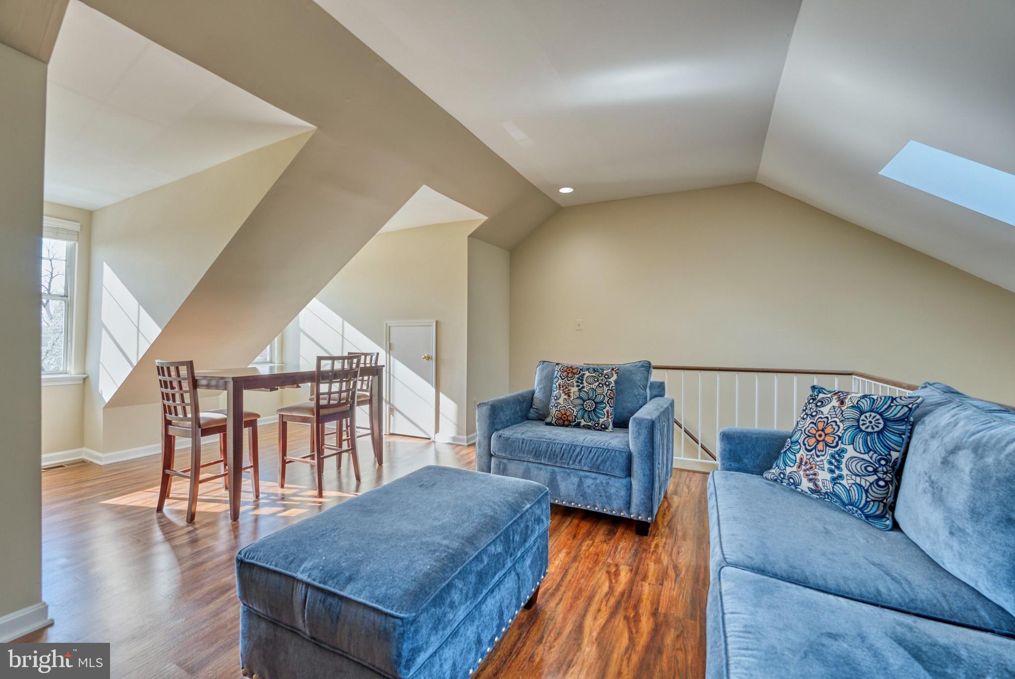 2041 Lyttonsville Road Silver Spring, MD 20910 - Photo 19 of 42 a living room with furniture and a wooden floor