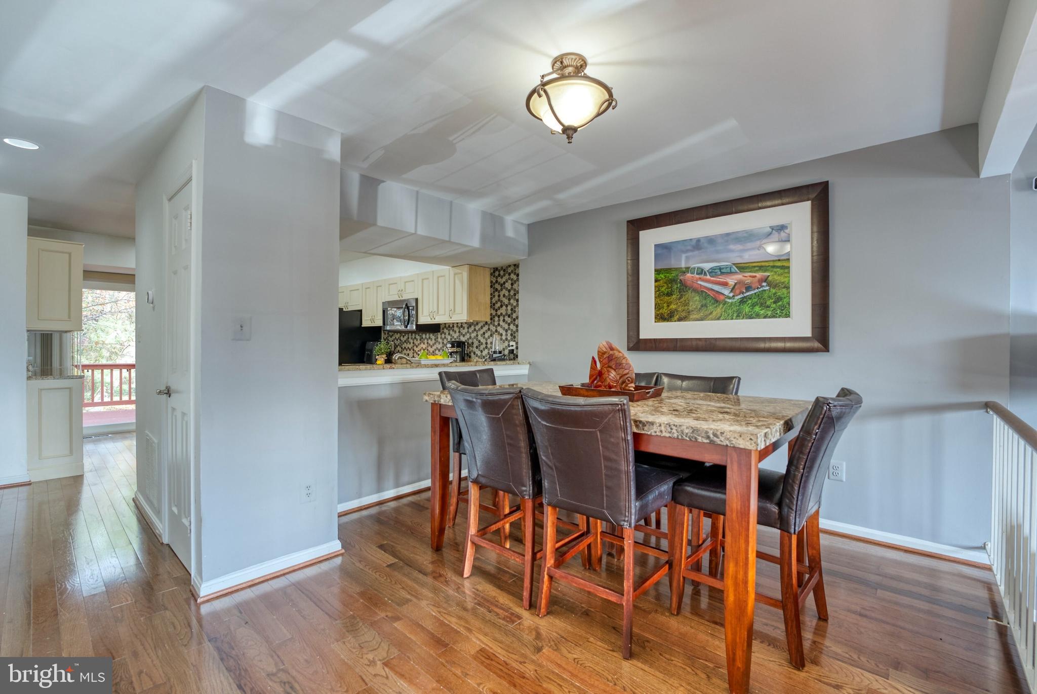 2041 Lyttonsville Road Silver Spring, MD 20910 - Photo 5 of 42 a view of a dining room with furniture and wooden floor