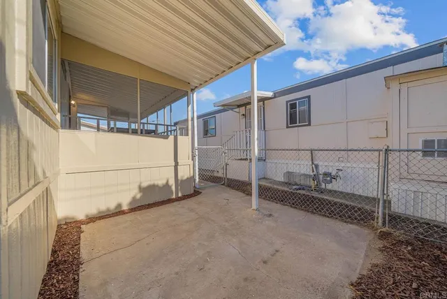 a view of a back yard of the house