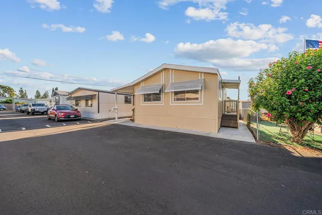 a cars parked in front of a house