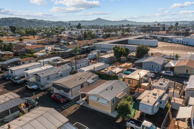 an aerial view of a city with lots of residential buildings