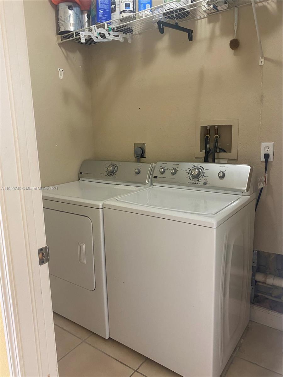 Hialeah Hialeah, FL 33018 - Photo 11 of 27 a utility room with dryer and washer