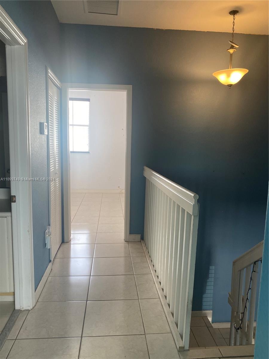 Hialeah Hialeah, FL 33018 - Photo 12 of 27 a view of a hallway to rooms