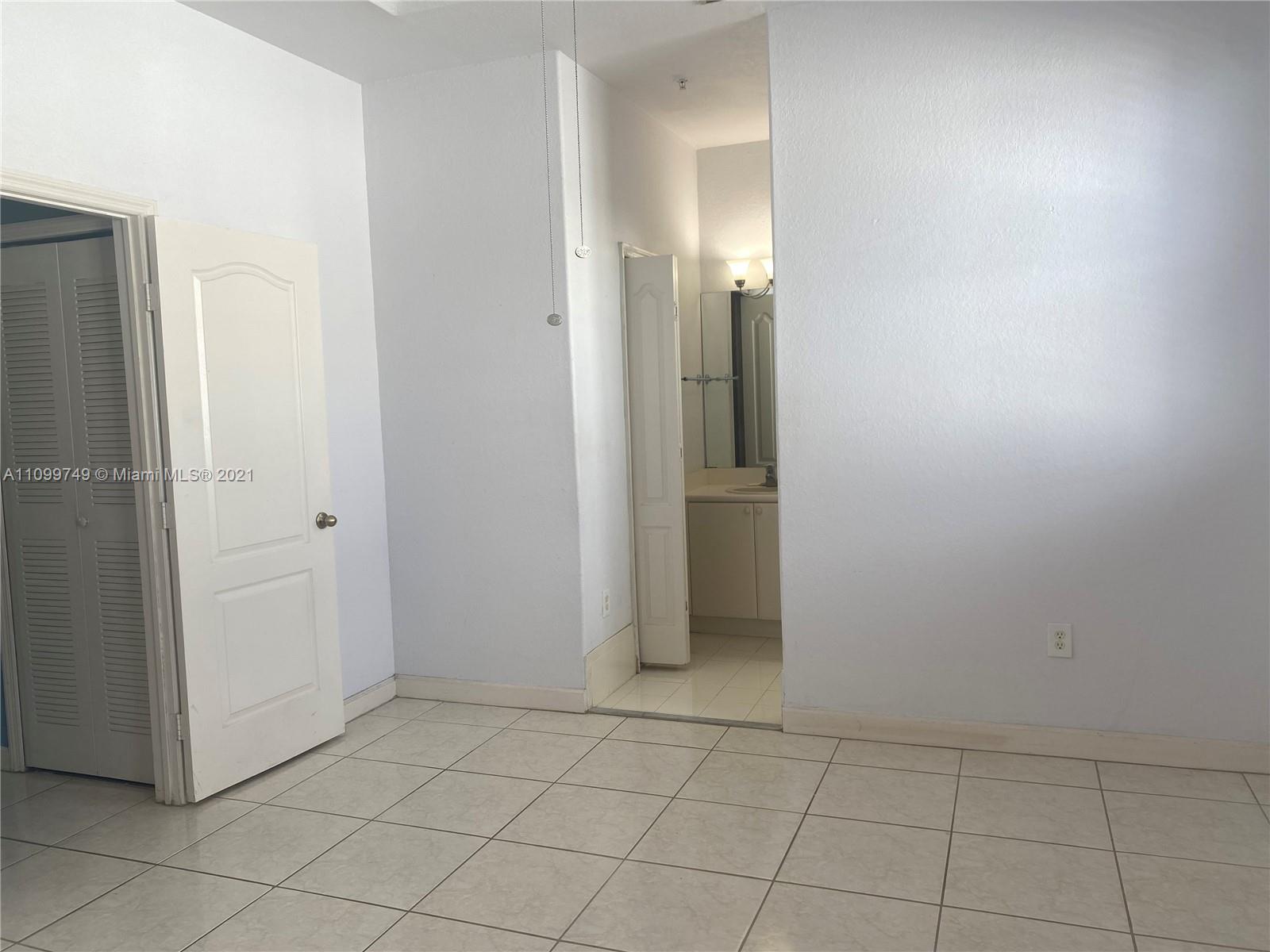 Hialeah Hialeah, FL 33018 - Photo 14 of 27 an empty room with mirror