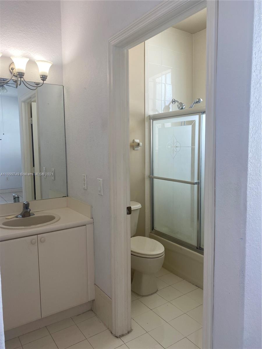 Hialeah Hialeah, FL 33018 - Photo 15 of 27 a bathroom with a sink toilet and shower