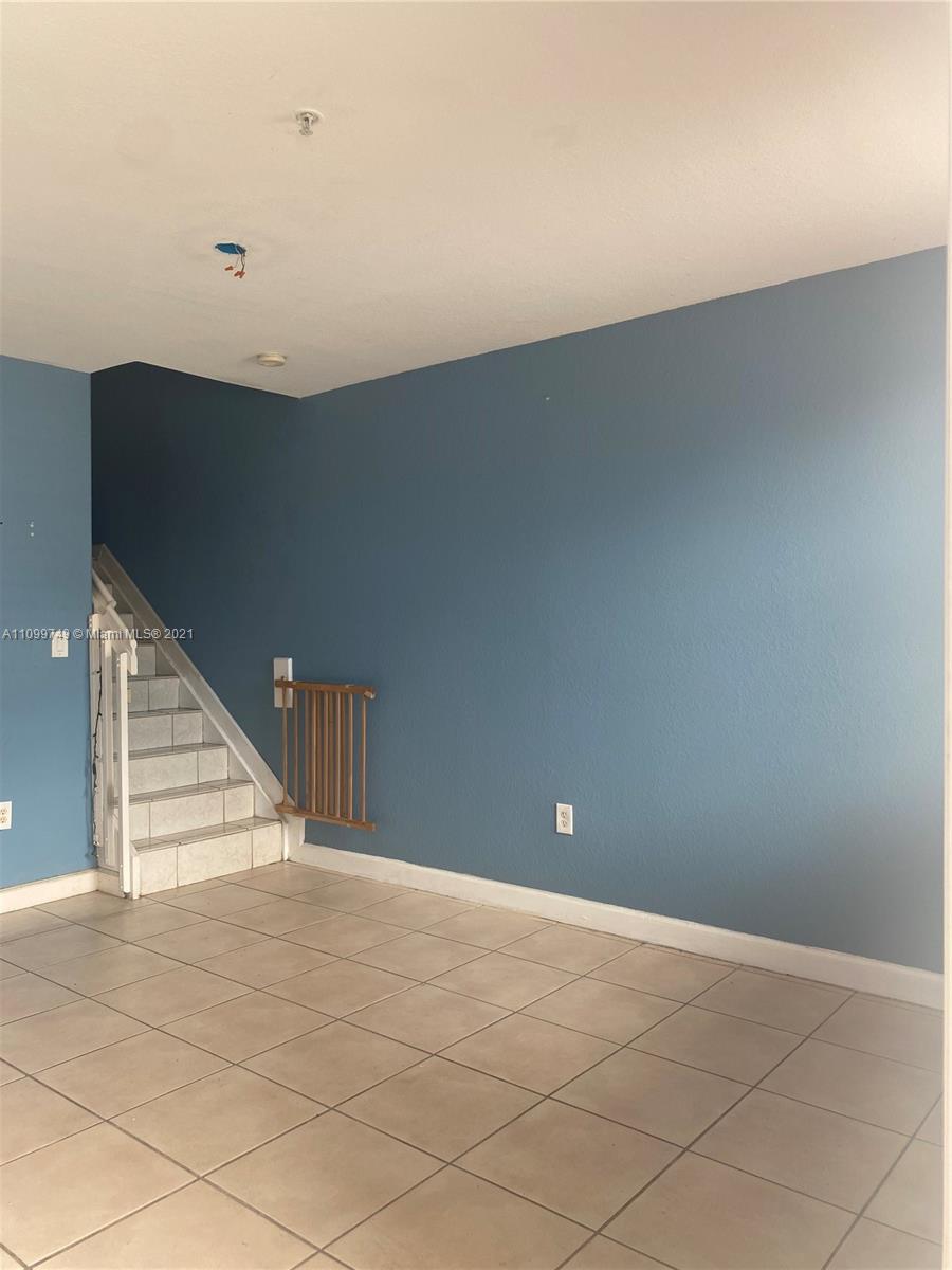 Hialeah Hialeah, FL 33018 - Photo 2 of 27 a view of an empty room with stairs
