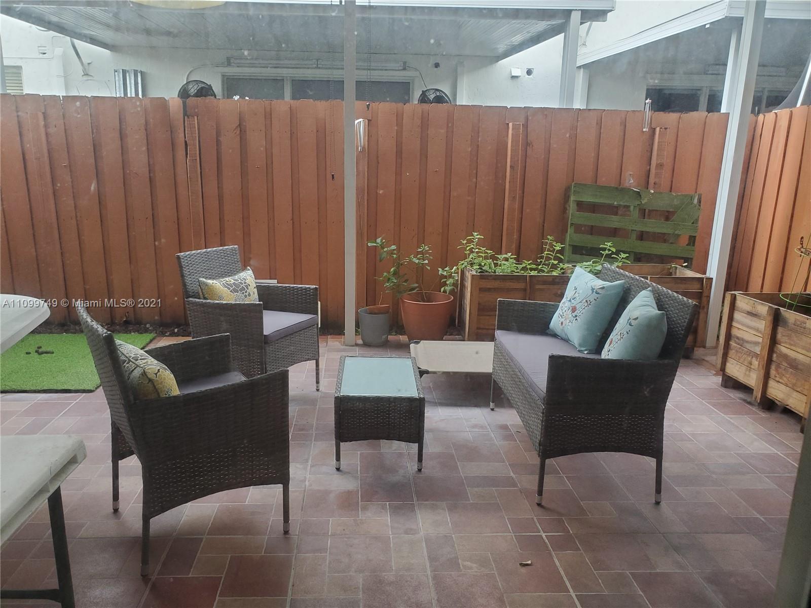 Hialeah Hialeah, FL 33018 - Photo 23 of 27 a outdoor living space with furniture and a couch