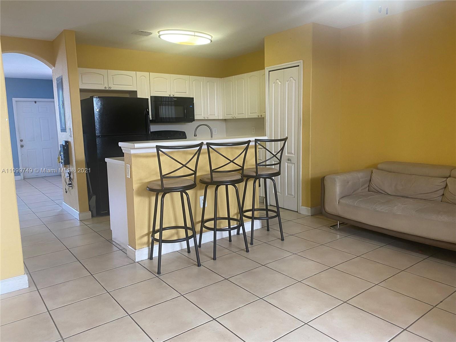 Hialeah Hialeah, FL 33018 - Photo 7 of 27 a view of a livingroom with furniture and a couch