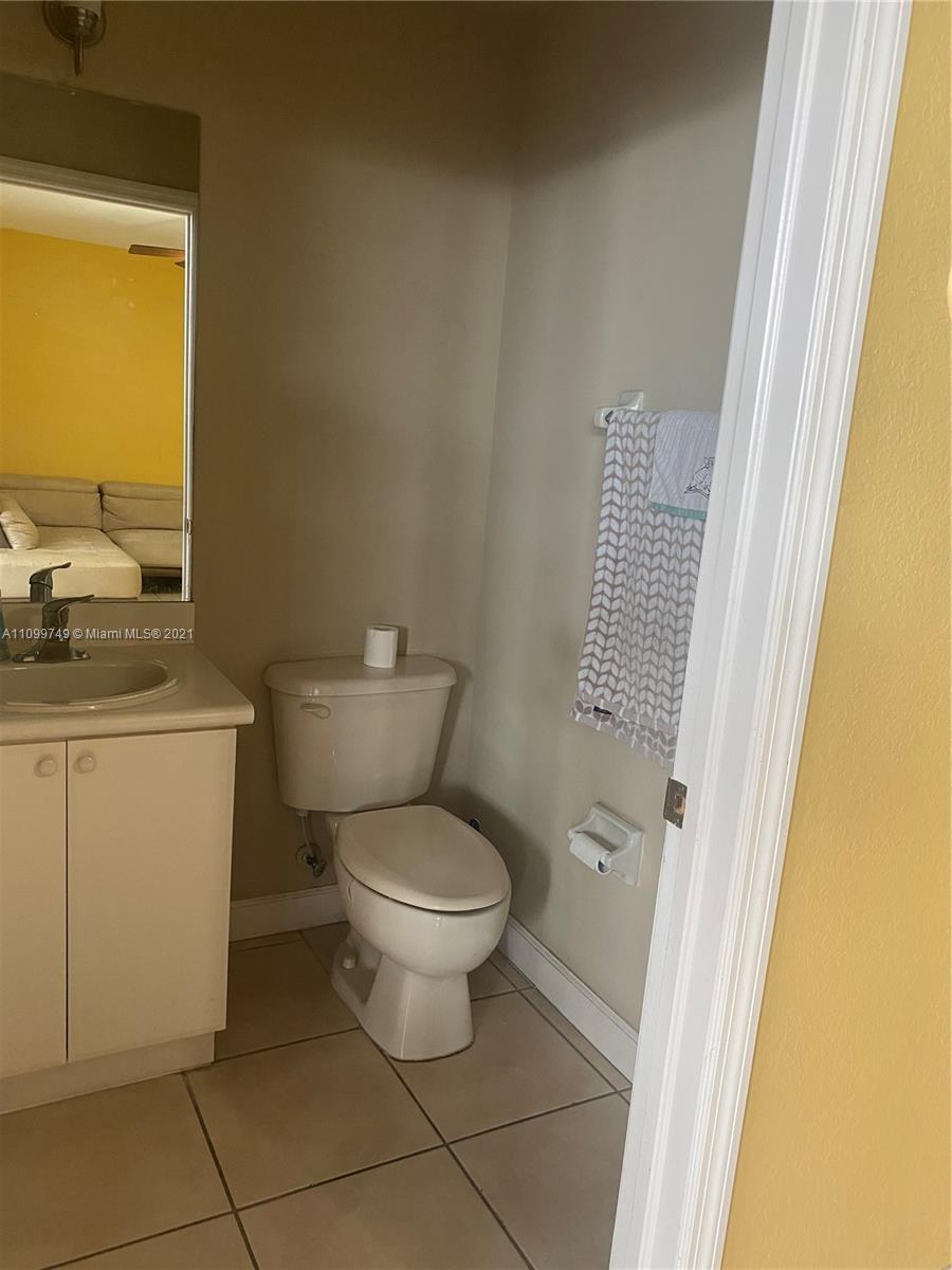 Hialeah Hialeah, FL 33018 - Photo 10 of 27 a white toilet sitting next to a sink