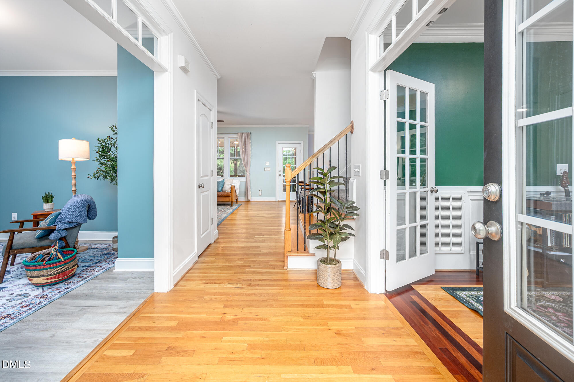 726 Ruth Circle Fuquay-Varina, NC 27526 - Photo 12 of 61 a view of a hallway with wooden floor and furniture