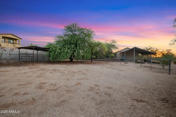 a view of a backyard with a patio