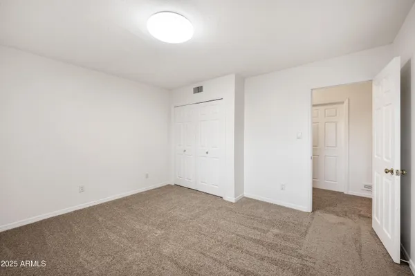 an empty room with a natural light