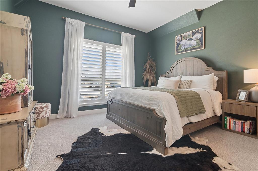 582 Broadleaf Way Haslet, TX 76052 - Photo 23 of 40 Secondary bedroom is set apart for privacy, front facing, ensuite bathroom. Walk in closet.