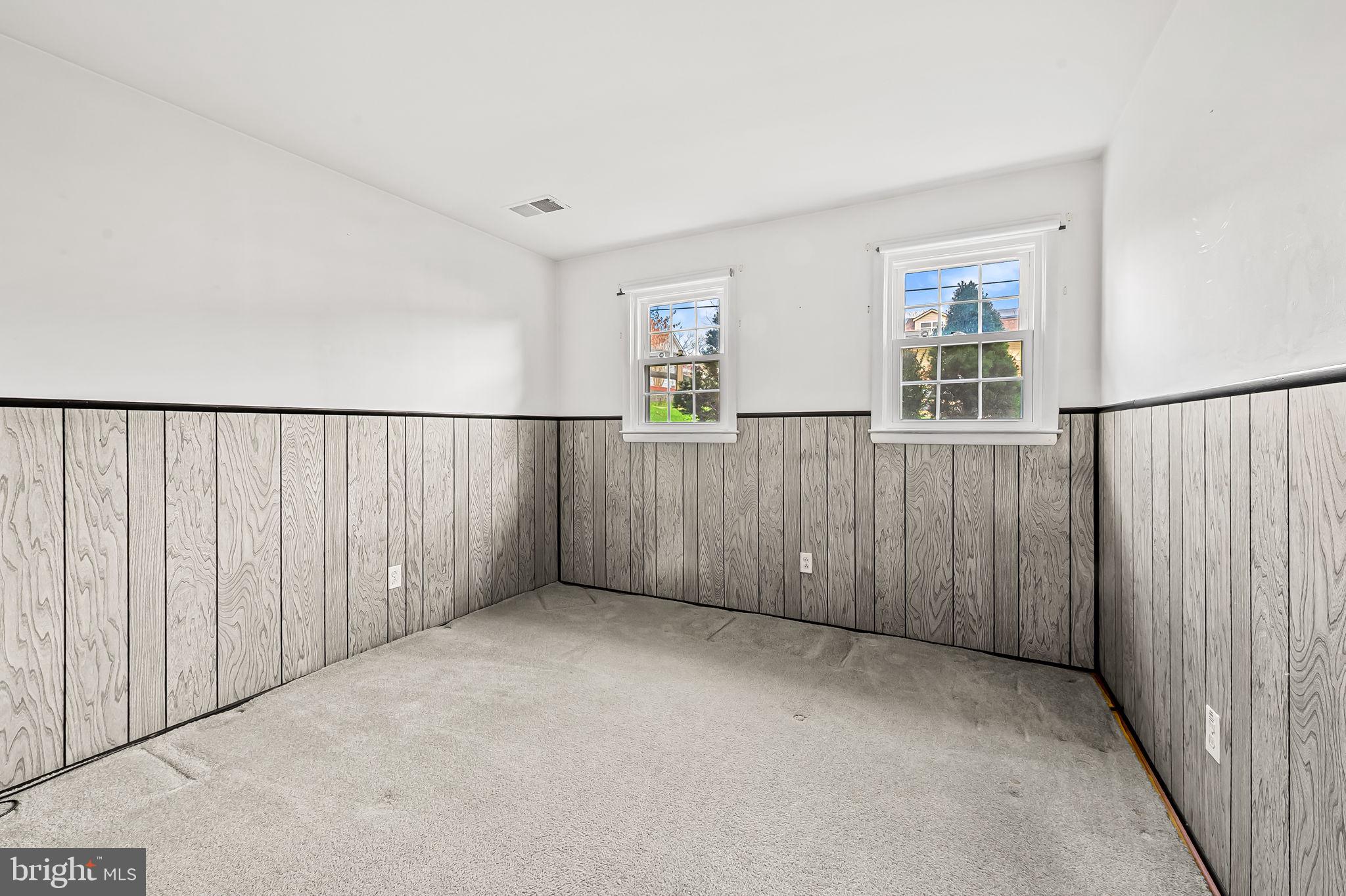 9382 North Laurel Road Laurel, MD 20723 - Photo 22 of 31 a view of an empty room with wooden floor