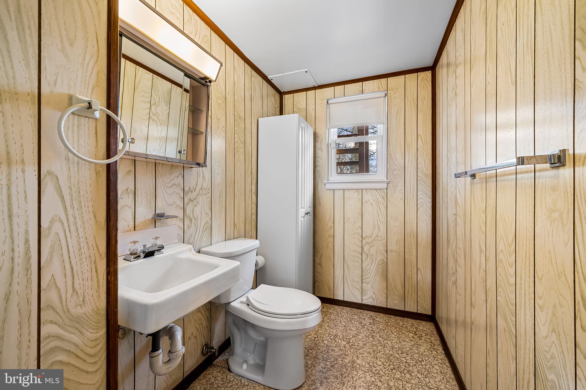 9382 North Laurel Road Laurel, MD 20723 - Photo 26 of 31 a bathroom with a sink a toilet and shower