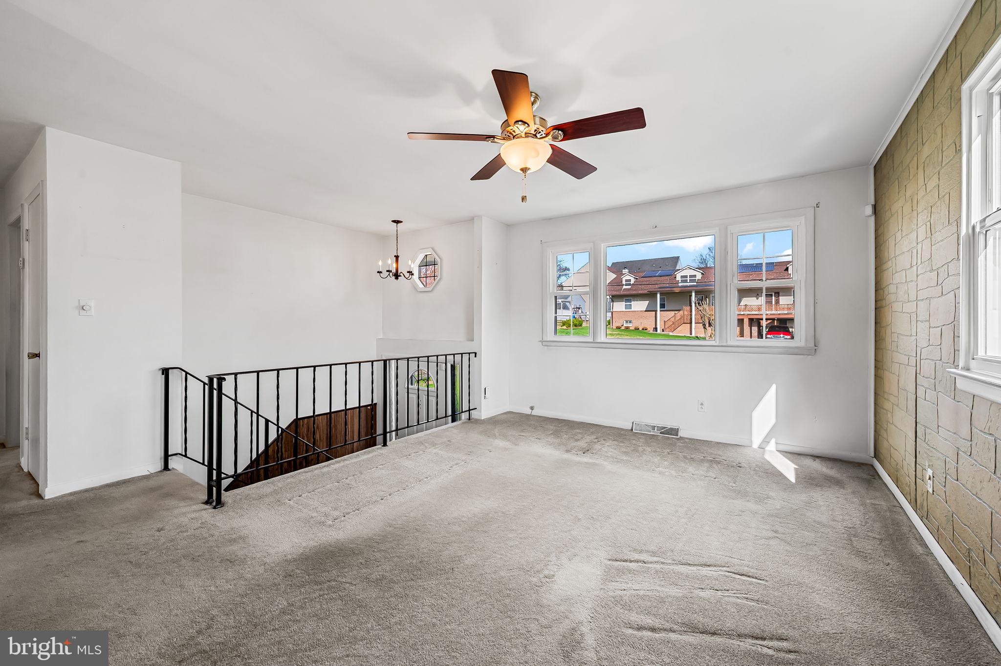 9382 North Laurel Road Laurel, MD 20723 - Photo 4 of 31 a view of a livingroom with a ceiling fan and window