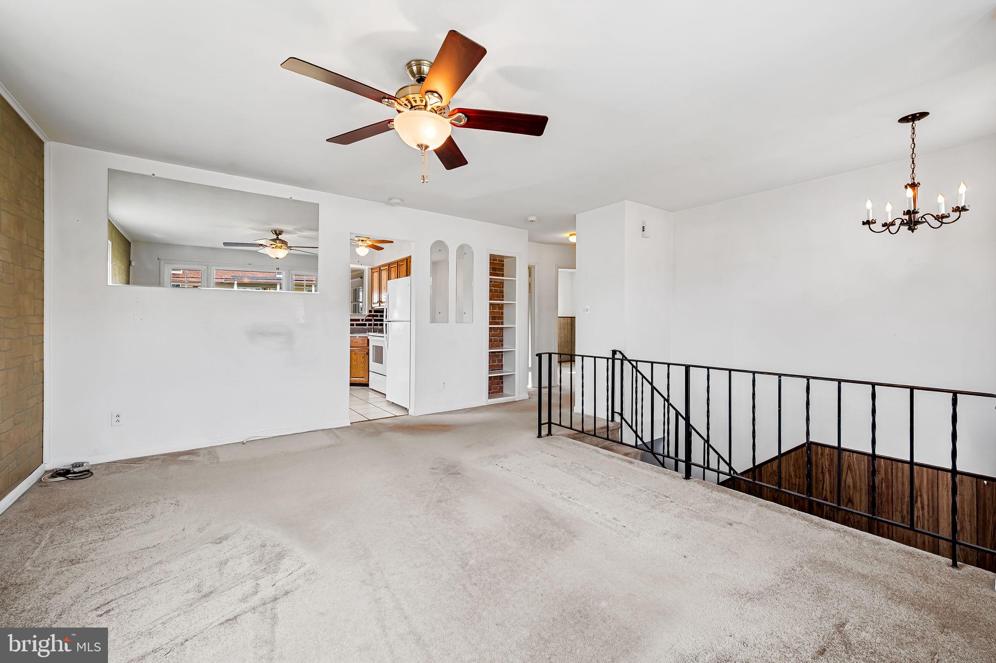 9382 North Laurel Road Laurel, MD 20723 - Photo 6 of 31 a view of a livingroom with a ceiling fan