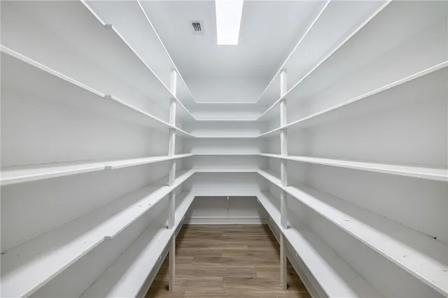 a view of an empty walk in closet