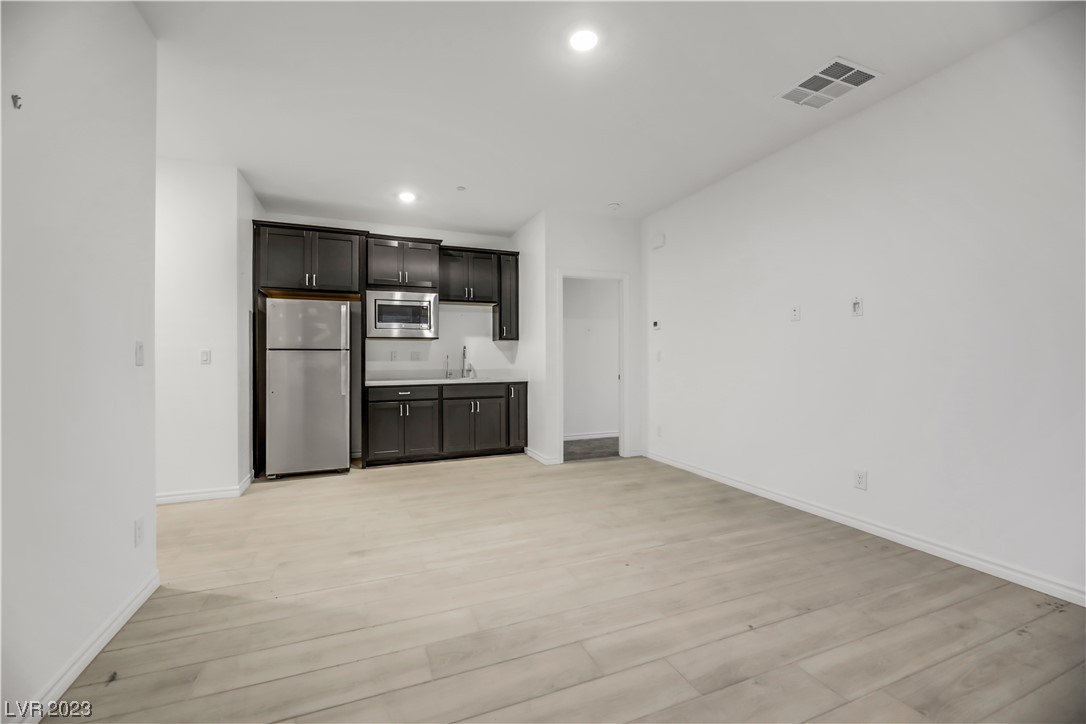 291 Robson Rdg Lane Henderson, NV 89015 - Photo 11 of 77 Next Gen Living Space looking toward doorway to Be