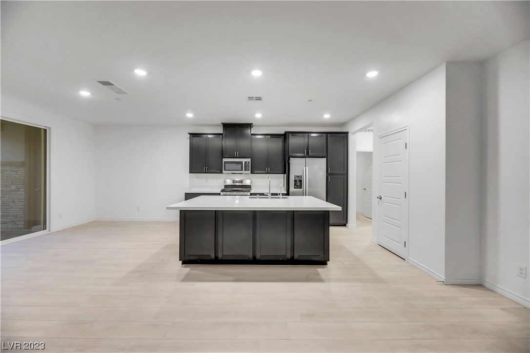 291 Robson Rdg Lane Henderson, NV 89015 - Photo 20 of 77 Enjoy Plenty of Kitchen Storage including Walk In