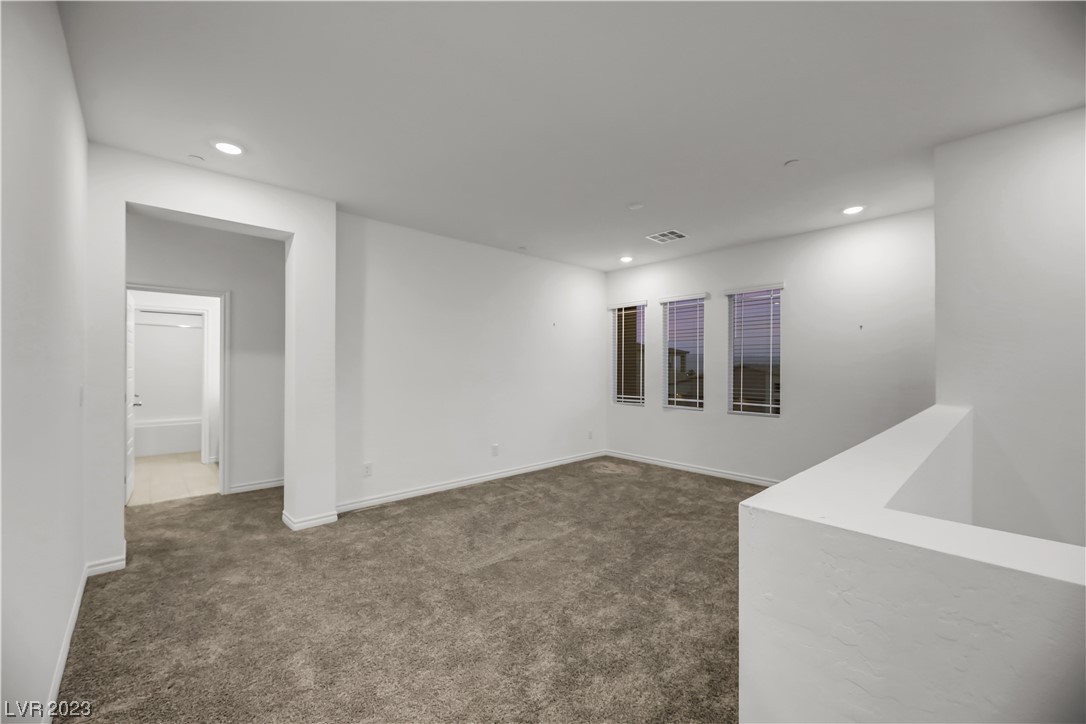 291 Robson Rdg Lane Henderson, NV 89015 - Photo 27 of 77 Upstairs Loft with Very Own Spacious Balcony conve