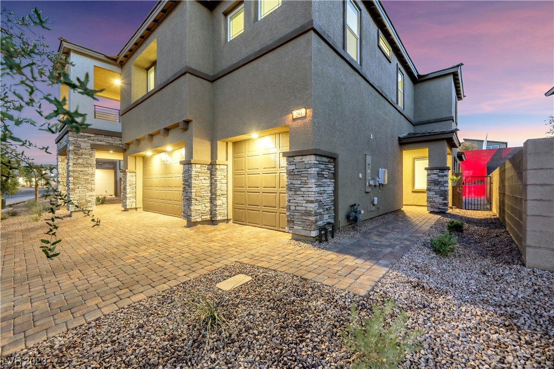 291 Robson Rdg Lane Henderson, NV 89015 - Photo 4 of 77 Showcasing Side Patio Entrance to Next Gen Suite