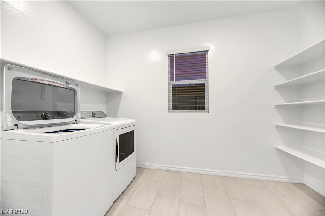 291 Robson Rdg Lane Henderson, NV 89015 - Photo 41 of 77 Second Washer & Dryer located upstairs outside Pri